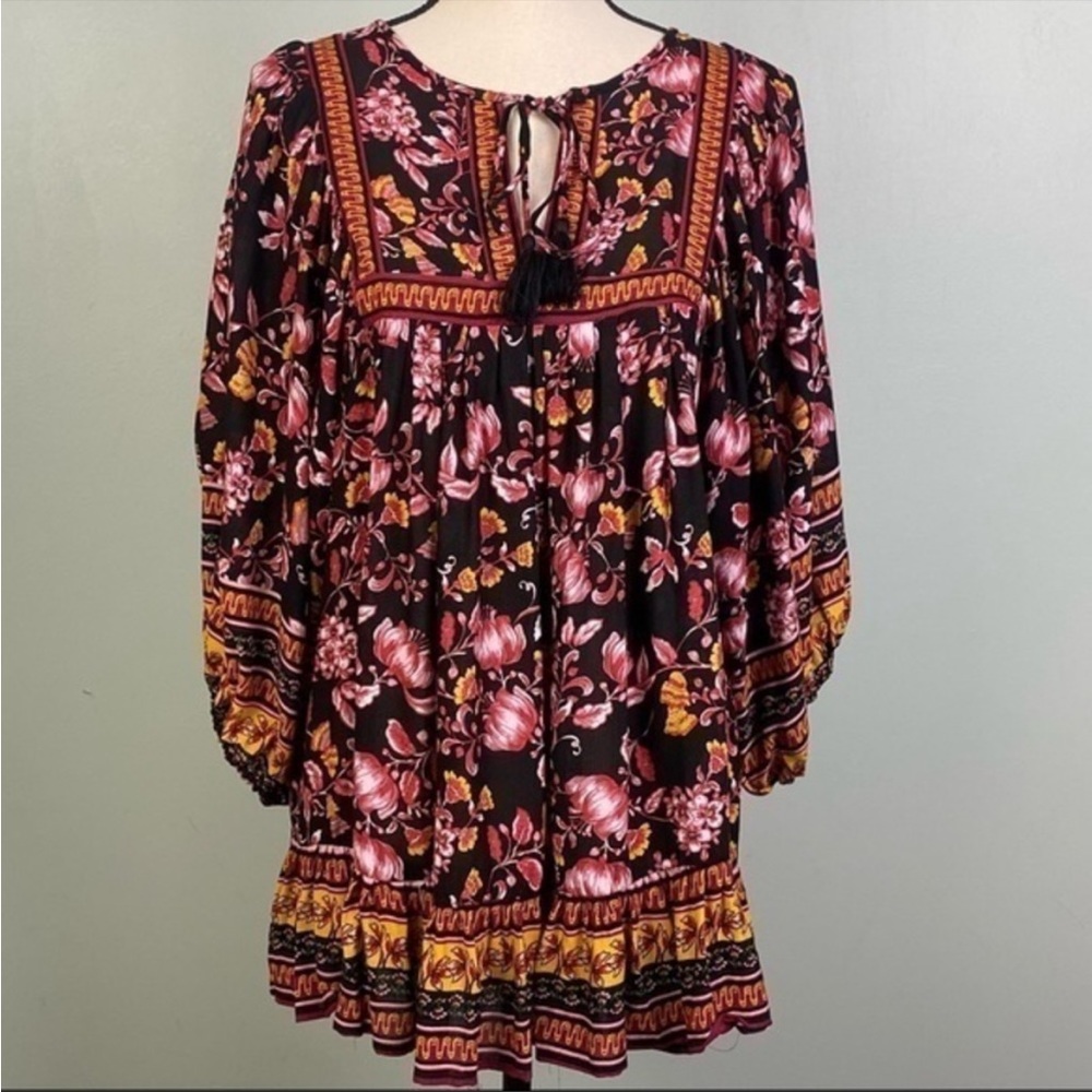 RACHEL ZOE peasant blouse with balloon sleeves and a skirted bottom. NWT.